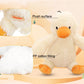 Cream plush duckling dog toy with orange beak and soft padded body, close-up