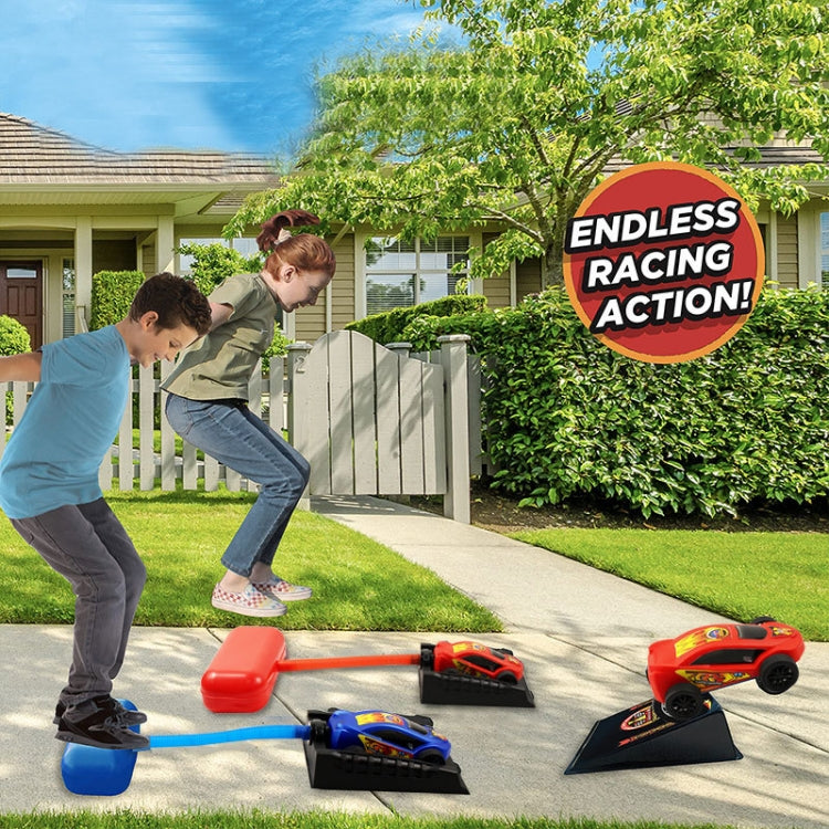 Outdoor rocket race car toy with pedal launcher and black jump ramp pad