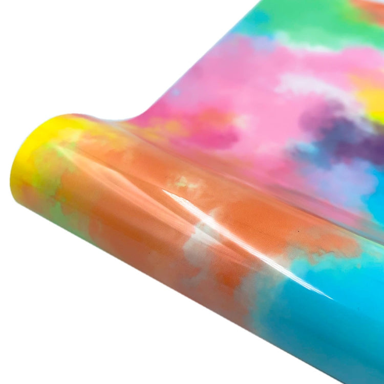 Watercolor tie-dye heat transfer vinyl roll, pink, orange, yellow and blue cloud pattern