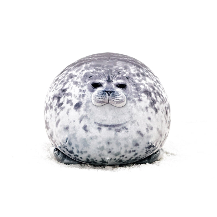Gray seal plush pillow with speckled pattern and cute face