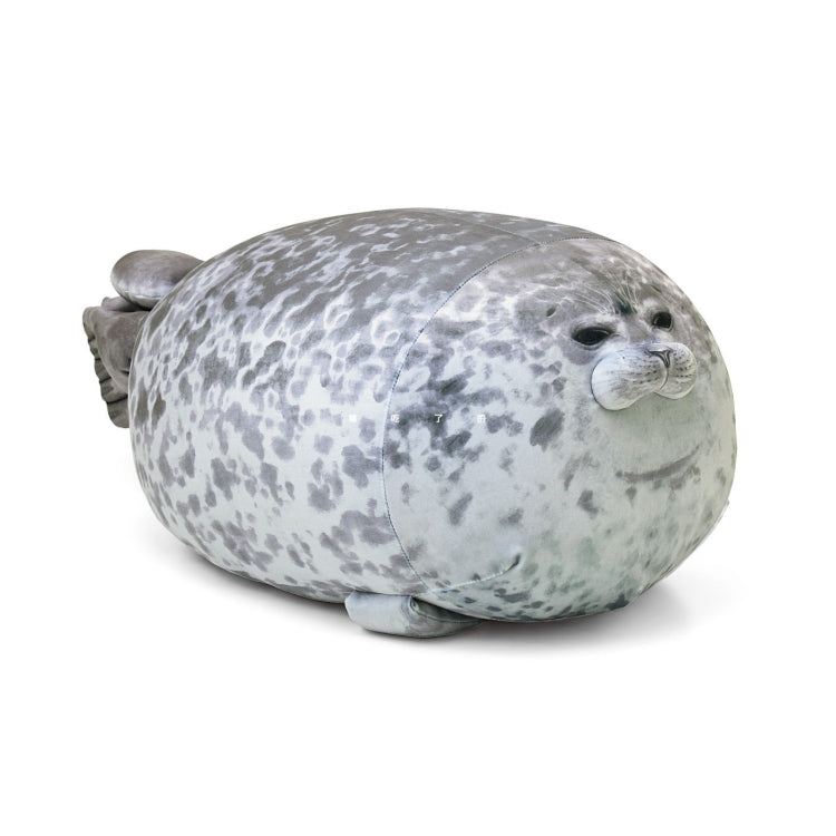 Speckled gray seal plush pillow with side view face and flipper detail