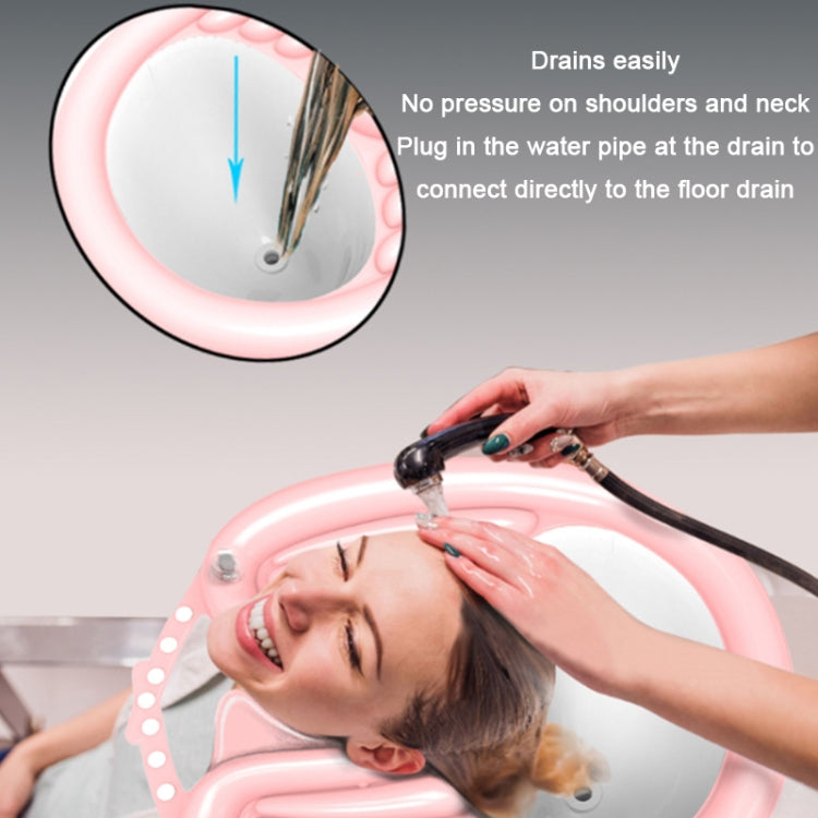 Pink reclining shampoo basin for hair washing with drain area and nozzle connection