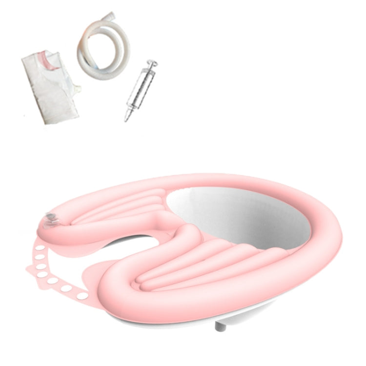 Pink reclining shampoo basin with built-in neck support and oval hair-wash basin