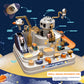 Space-themed mechanical rail car track toy with astronaut figures and three vehicle compartments