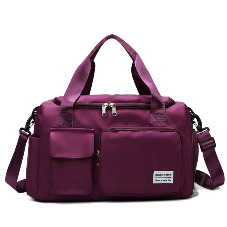 Deep purple waterproof travel gym bag with front zip pockets and shoulder strap