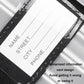 Black luggage strap with information card pocket