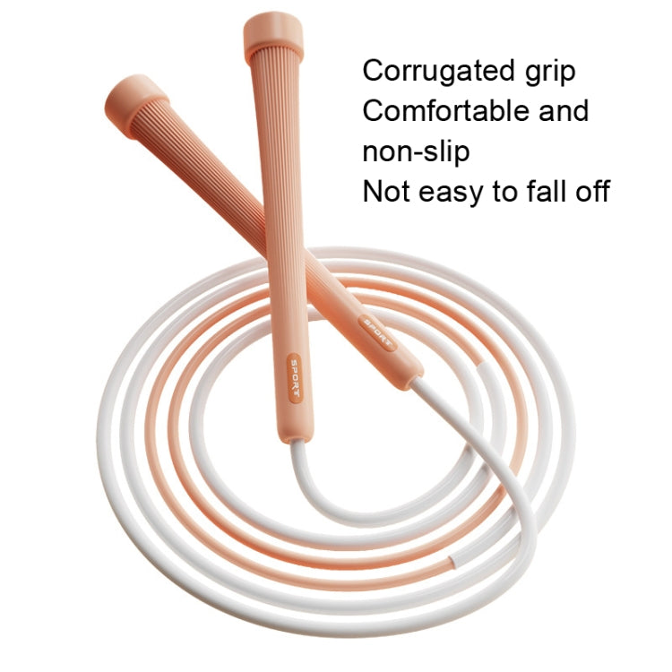 Kids skipping rope with non-slip ribbed grip handles and white coiled cord.