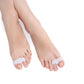 Two feet wearing white double ring toe separators, toes spaced by curved bands