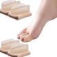 Beige tube toe separator worn on big toe, ribbed sleeve supports toe alignment