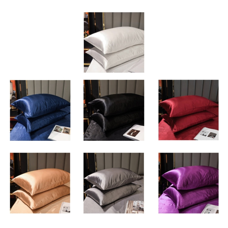 Satin pillowcase set display with folded pillowcases in black and other colors