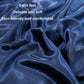 Blue ice-silk pillowcase fabric close-up with smooth, satiny texture