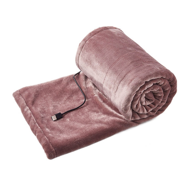 Rolled portable USB electric blanket, dusty pink with controller cord and plug