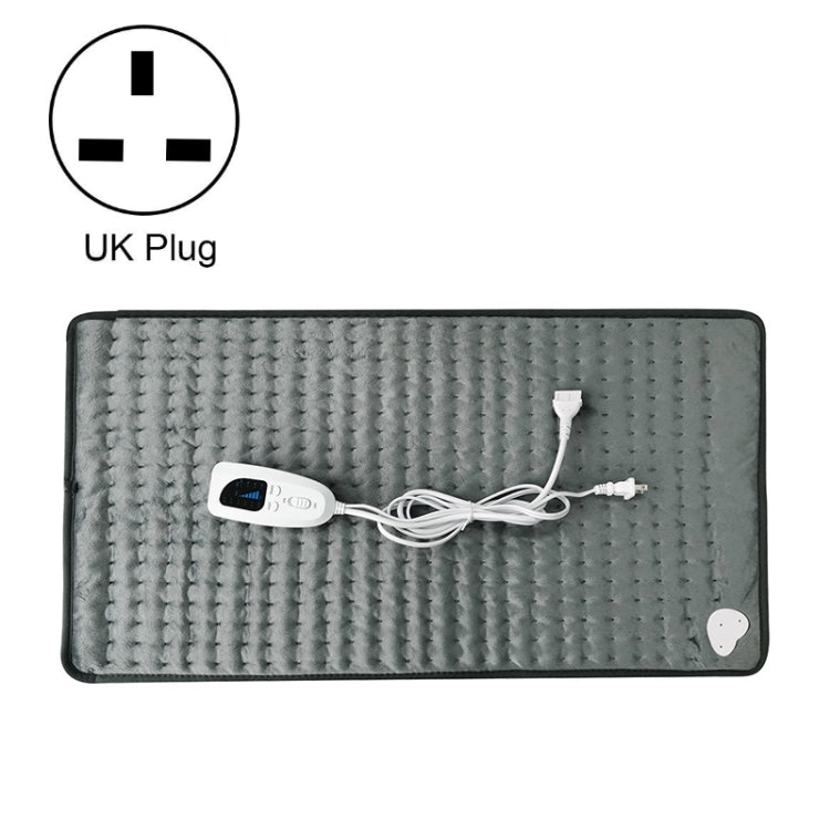 Electric heating pad blanket in dark gray with controller and cord, rectangular 60x30cm