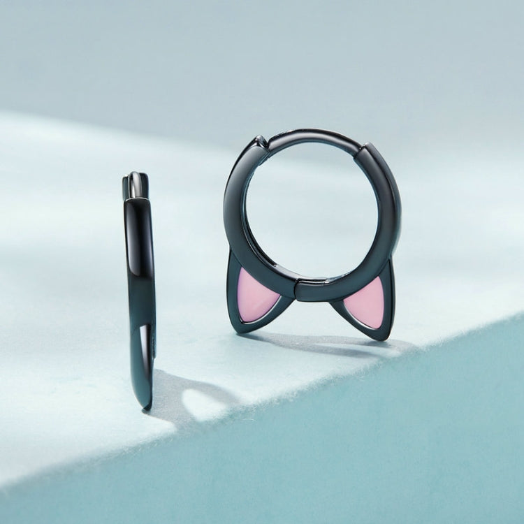 Cat-ear hoop earrings, one earring shown, dark silver finish with pink inner triangles