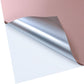 Silver matte metallic self-adhesive vinyl sheet with curled corner