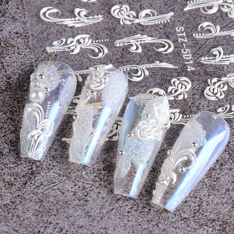 3D carved nail art sticker sheet with white baroque scrolls and glitter nail application