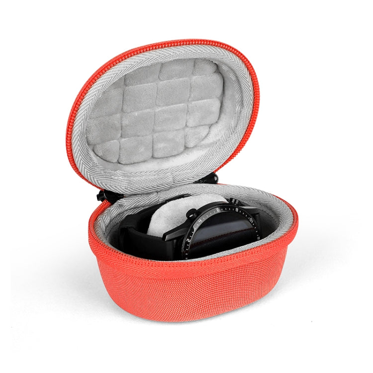 Orange round smartwatch storage case with plush inner lining and zip closure.
