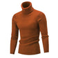 Men's rust-brown cable-knit turtleneck sweater with long sleeves and fitted hem