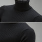 Black high-collar knit sweater close-up, ribbed turtleneck and textured knit