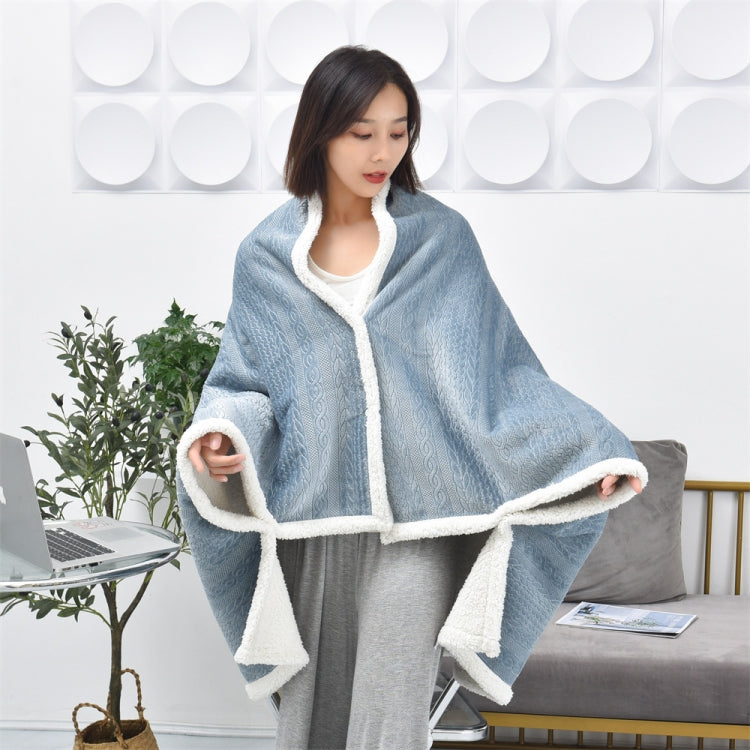 Misty blue flannel shawl blanket with embossed texture and white fleece border trim