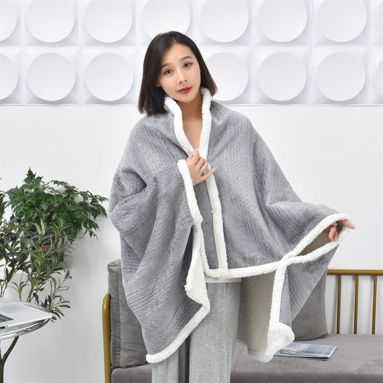 Light grey flannel shawl blanket with embossed texture and white fleece trim