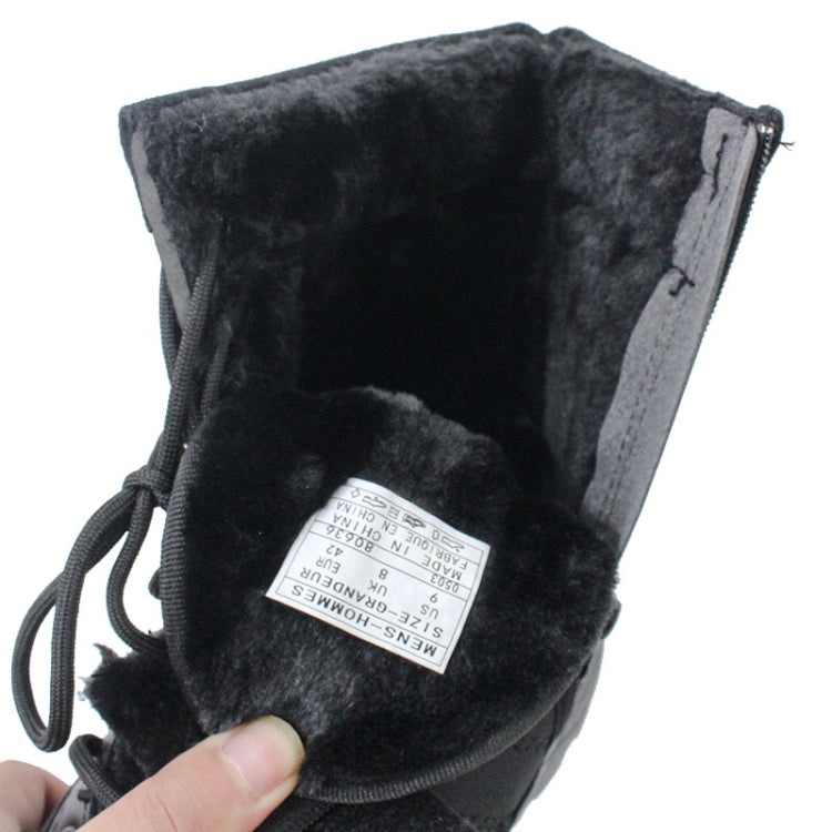Black padded high-top sports boot with lace-up and soft fleece-lined interior.