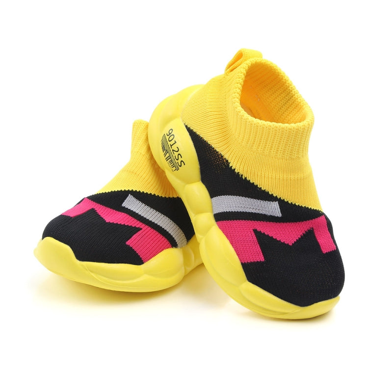 Kids yellow and black sock-style sneakers with pink and white stripes, rounded rubber sole