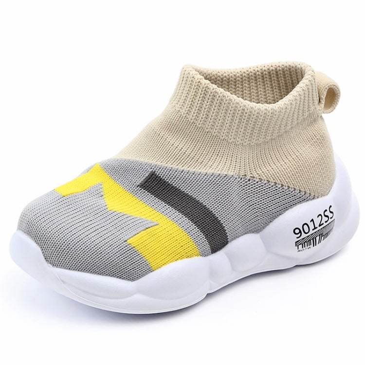 Kids slip-on knit shoes, beige collar with gray body and yellow/black stripe logo