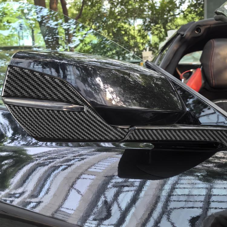 Carbon-fiber look rearview mirror scratch protection sticker installed on side mirror