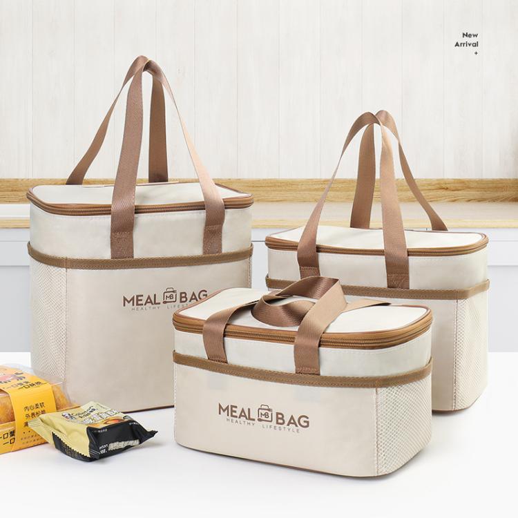 Set of three cream insulated lunch bags with brown handles and zippered tops