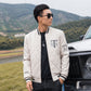 White quilted baseball jacket worn by a person, full-zip front with ribbed striped cuffs