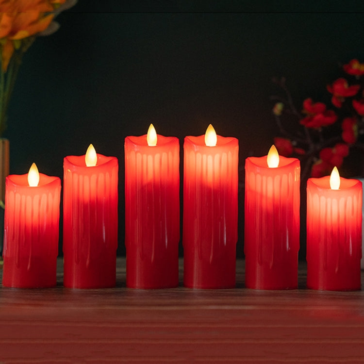 Row of red LED flameless candles with glowing wick tips, decorative display of multiple candles.