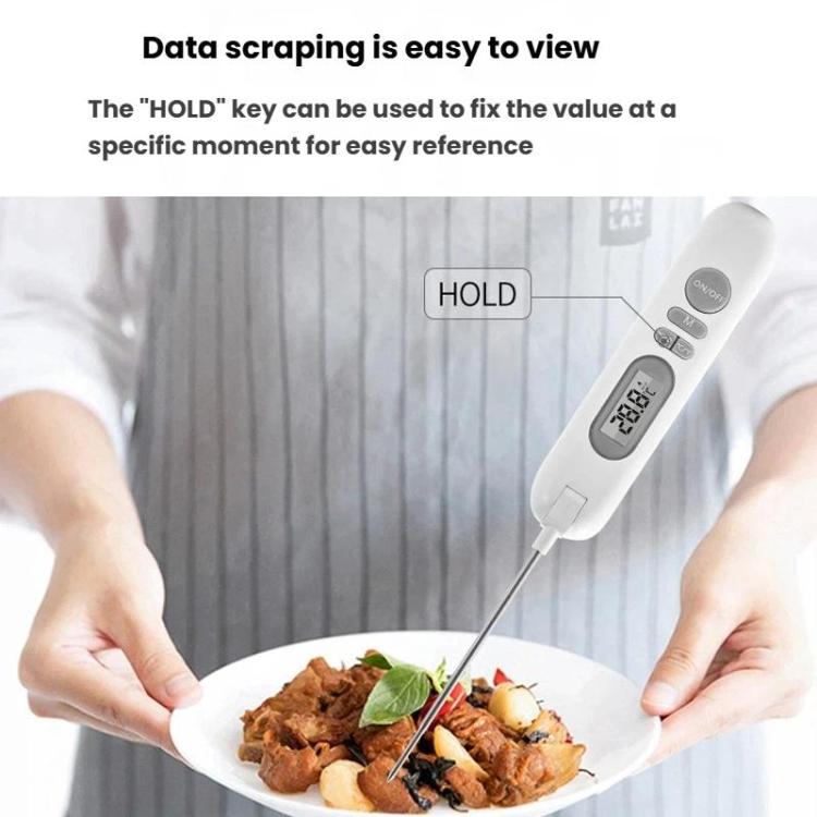 White digital food thermometer using HOLD button, LCD shows temperature