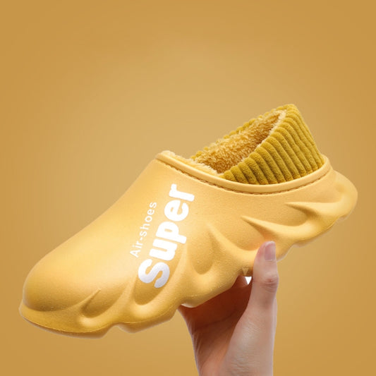 Yellow waterproof slippers with ribbed knit lining and cushioned thick sole