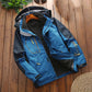 Men's outdoor jacket with fleece-lined hood, blue and black, zip pockets and drawstring hem