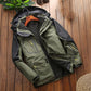 Men's fleece-lined outdoor jacket, olive green outer with black hood lining and chest pocket