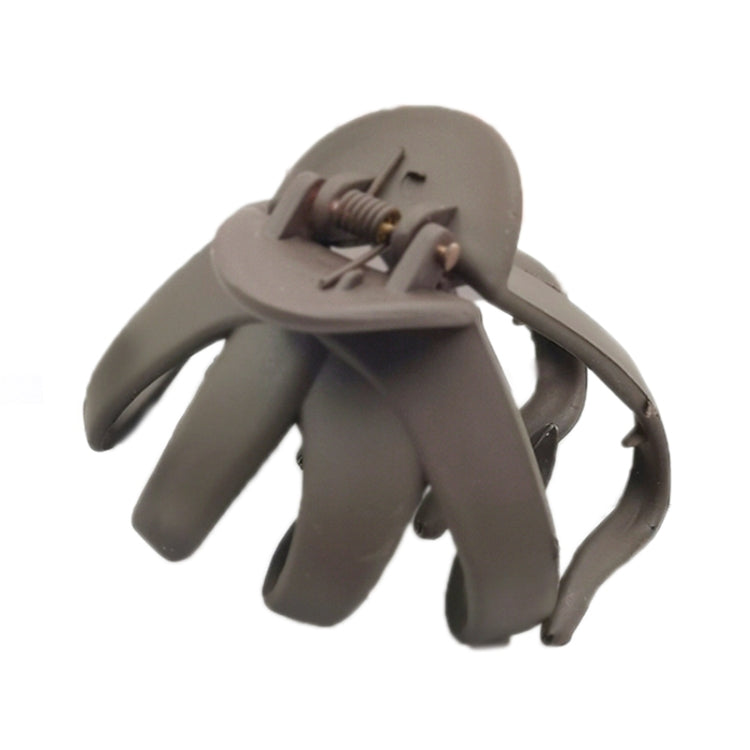 Brown frosted hair grab claw clip with spring hinge and wide teeth prongs