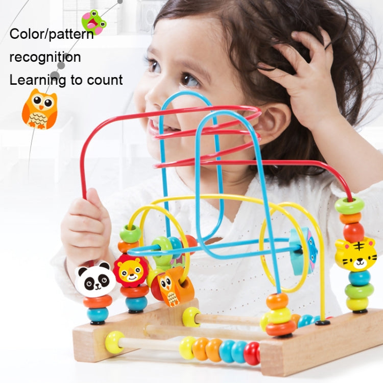 Wooden bead maze toy with jungle animal bead characters, used by a child at playtime