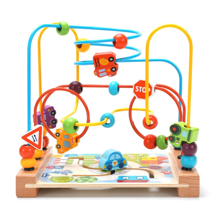 Wooden bead maze with vehicle and road-themed cutouts over a play mat