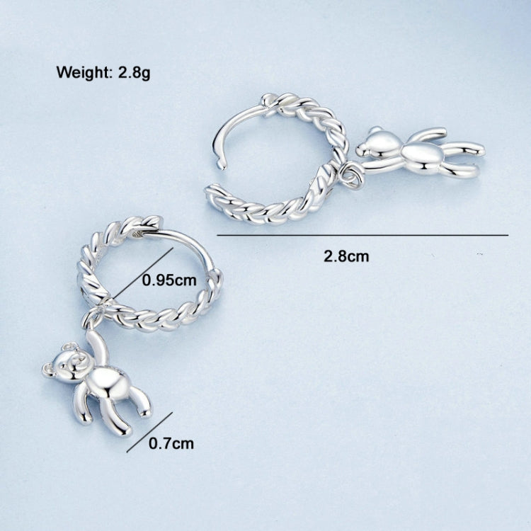 Silver-tone bear charm hoop earrings with twist chain links and dangling bear figure