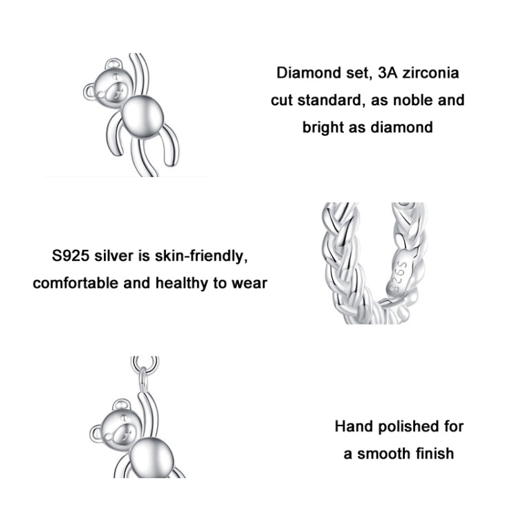 Polished silver-tone bear charm hoop earrings with dangling animal pendant