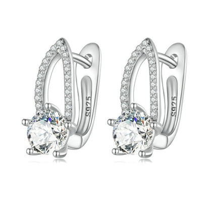 Hollow line hoop earrings in sterling silver with round clear zirconia accents