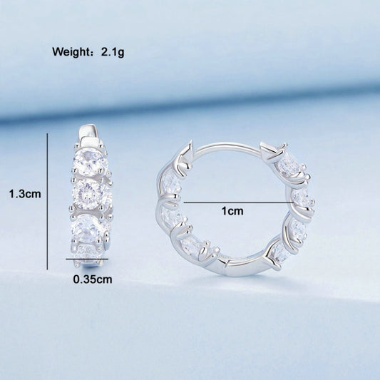 Silver hoop earrings with three-tier zirconia flower design on a hinged rim