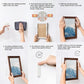 Hands installing hook-and-loop picture hanging strips on a photo frame