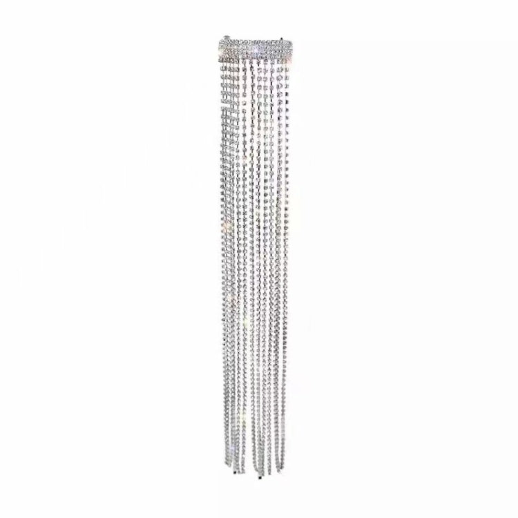 Diamond rhinestone chain fringe hair band with silver-toned dangling strands.