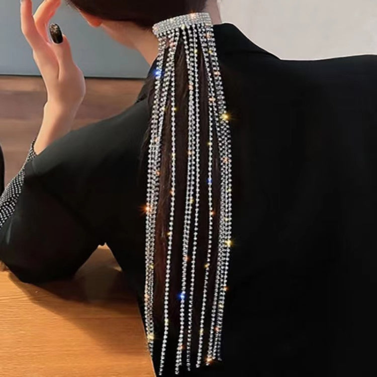 Rhinestone chain fringe hair band with wide top and dangling strands.