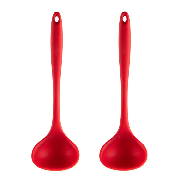 Red silicone soup spoon with solid bowl and loop handle, nonstick cooking utensil.