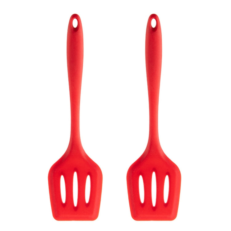 Red silicone leak shovel spoon with three-slot head and loop handle.