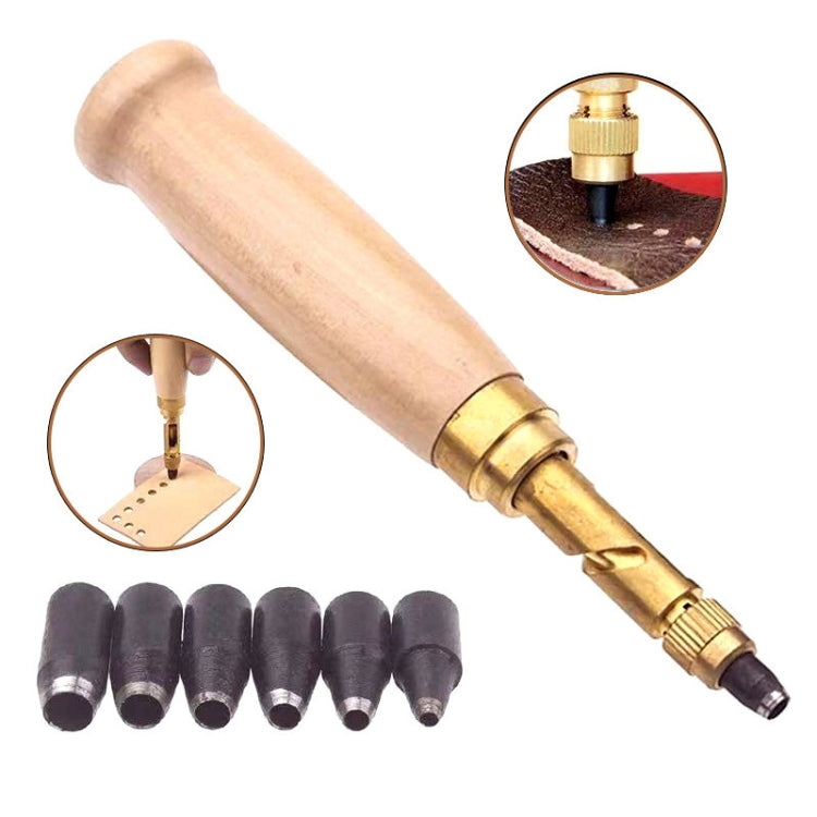 Wood-handled belt punch with brass tip and multiple black punch dies