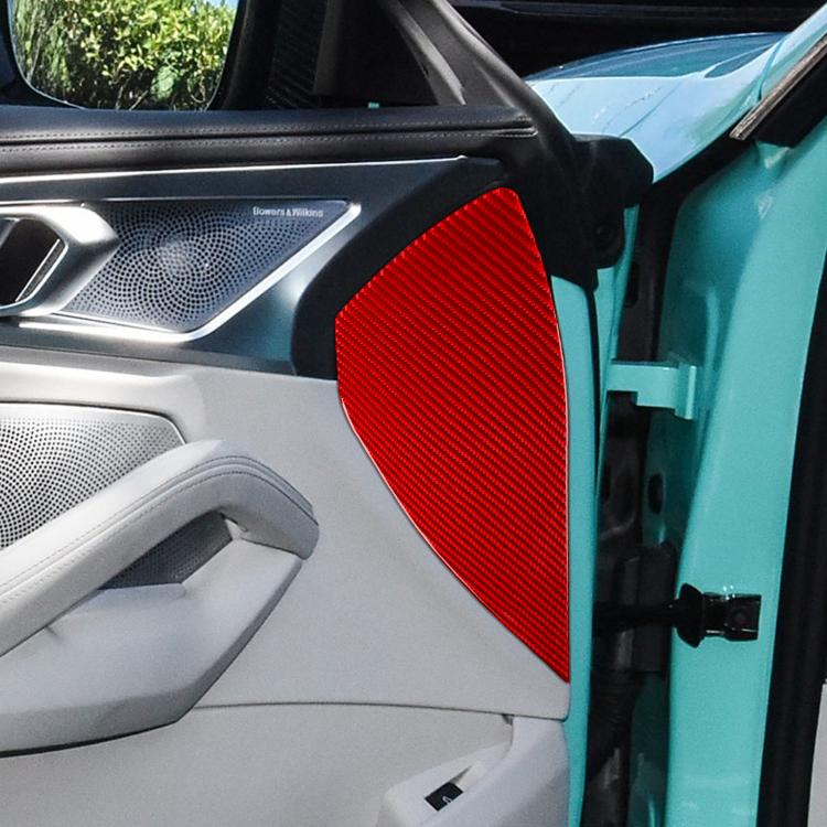 Red carbon-fiber style door buffer sticker applied on inner door panel